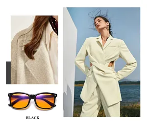 Vue détaillée de lunettes de soleil carrées tendance avec monture noire et verres orange.