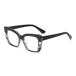 Fashionable cat eye blue light blocking glasses with stylish black and leopard frame for women.