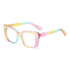 Colorful gradient gold cat eye blue light blocking glasses front side view main product image.