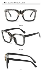 Detail of black square anti blue light glasses with rhinestones and butterfly crystal design.