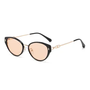 Chic cat-eye sunglasses with black frame, gold metal temples and light orange lenses.