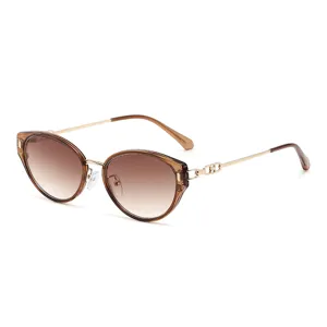 Stylish brown gradient cat-eye sunglasses with elegant metal temples and chic chain links.