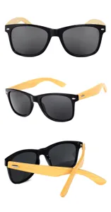Gafas de sol retro con patillas de bambú y montura negra para protección elegante y estilo natural.