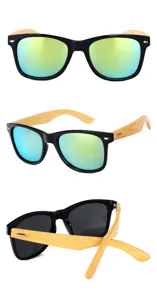 Vista detallada de gafas de sol con montura negra y bonitas varillas de madera elegantes.