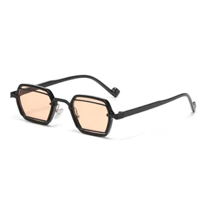 Modische geometrische kleine Sonnenbrille mit schwarzem Rahmen und orangen Gläsern