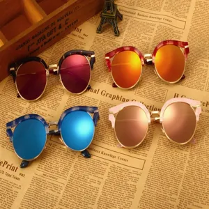 Vintage retro colored mirror sunglasses for women with metal browline frames and trendy lenses.