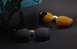 Gothic skull sunglasses with reflective lenses and metal frame, perfect for street fashion style.