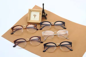 Detailed view of multiple stylish semi-rimless optical glasses frames in various colors.