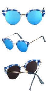 Vintage round sunglasses for women with trendy blue mirrored lenses and stylish marble frames.