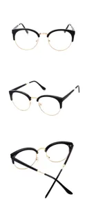 Detailed view of black and gold metal semi-rimless optical glasses frame, retro style.