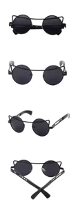 Detailed view of black round sunglasses with unique cat ear metal top bar and hollow temples.