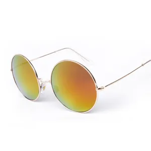 Lunettes de soleil vintage à monture ronde en métal avec verres réfléchissants colorés.