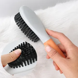 Pet grooming brush for cats and dogs, soft bristle slicker brush for removing loose pet fur.