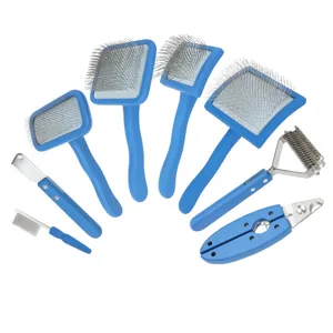 Professional pet grooming brush set with slicker comb, dematting tool, and nail clipper for dogs.