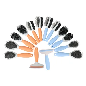 Set of blue and orange pet grooming brushes, double-sided dematting and slicker brushes for cats.