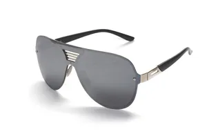 Detail shot of trendy large frame shield sunglasses with grey reflective lenses and metal cutout.