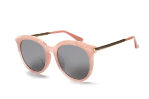 Detailansicht schicker rosa Sonnenbrillen für Damen mit goldenen Metallbügeln und dunklen Gläsern.