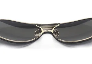Close-up detail of stylish shield sunglasses bridge and nose pads, premium metal fashion eyewear.