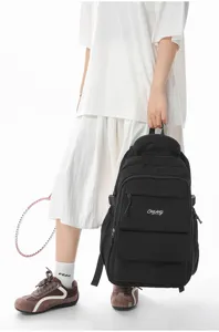 Japanese style large capacity school backpack with embroidered details for girls