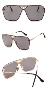 Stylish one-piece lens sunglasses with metallic gold frame and unique V-shaped bridge design.