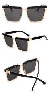 Occhiali da sole quadrati oversize per uomo e donna, eleganti occhiali alla moda nero e oro.