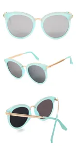 Lunettes de soleil tendance avec monture marbrée vert menthe et branches métalliques