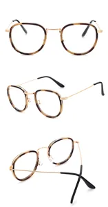 Lunettes de vue ovales style preppy, monture metal dore et motif ecaille retro chic.