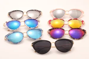 Trendy cat-eye sunglasses with colorful reflective lenses and metal frames for stylish street wear.