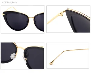 Classic black and gold cat-eye sunglasses with detailed metal temples and dark tinted lenses.