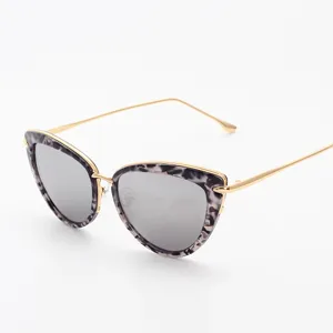 Chic cat-eye sunglasses featuring marble frame, gold metal temples and silver mirrored lenses.