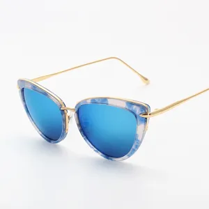 Stylish cat-eye sunglasses with blue mirrored lenses and gold temples for women and daily wear.