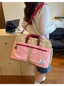Large capacity outdoor travel duffel bag with color-block design and shoulder strap