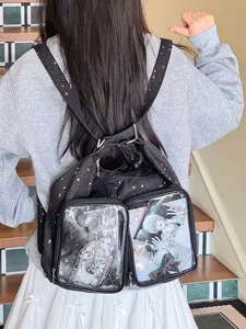 Back view of a black Harajuku style star print backpack with transparent ita bag pockets