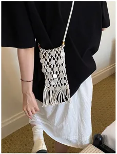 Bohemian woven macrame crossbody phone bag with long fringe and shell disc details