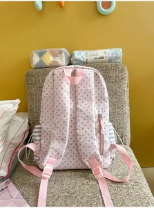Cute star pink backpack for girls, stylish large capacity school bag for students. Durable and sweet.