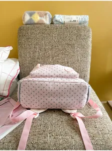 Cute star pink school backpack for girls, large capacity casual daypack for student daily use.