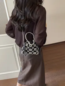 Stylish black pouch bag with silver metallic beaded mesh handle for women and girls chic daily.