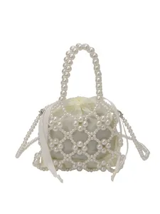 Elegant white pearl beaded handbag for women and girls, chic hollow crossbody pouch bag.