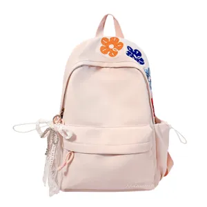 Japanischer Harajuku Stil rosa Rucksack mit Blumenstickerei und niedlicher weißer Schleife.