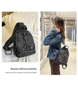 Detailansicht eines Vintage-Rucksacks aus gewaschenem Denim mit asiatischem Model in Eleganz
