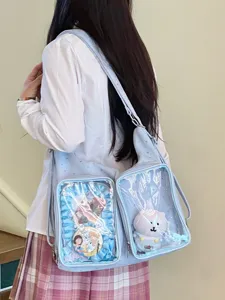 Asian model wearing a Japanese Harajuku style light blue ita bag with transparent windows
