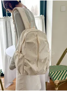 Zaino bianco crema con stampe a stella grigia e grande capacità per scuola e viaggi