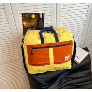 Large capacity color-block nylon travel bag with shoulder strap and handles for outdoor travel