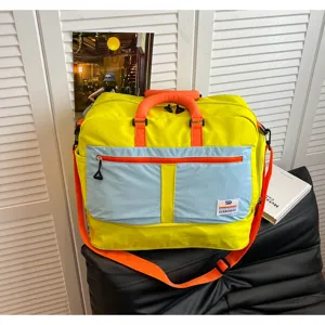 Vibrant color-block travel bag with large capacity for outdoor hiking and casual use