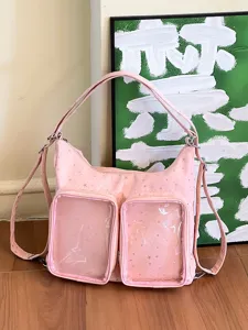Front view of pink Harajuku ita bag with star print and dual clear PVC windows
