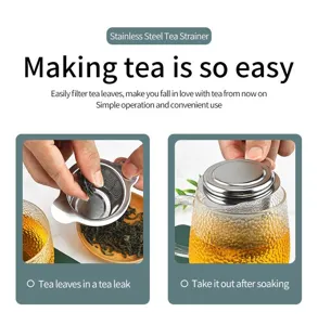Close-up detail of the stainless steel tea strainer showing fine mesh and dual handles for easy use.
