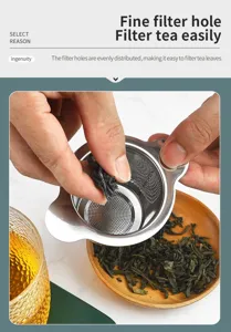 Stainless steel tea strainer detail showing fine mesh and double handles for easy brewing.