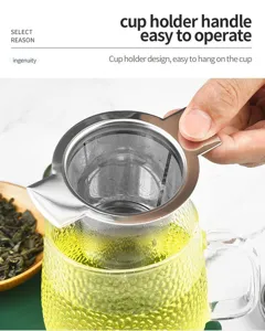 Passoire à thé en acier inoxydable avec deux poignées pour tasses et théières filtre.