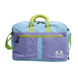 Full view of the color-clash outdoor travel bag in vibrant blue and purple panels