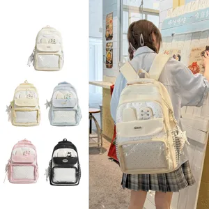 Zaino scolastico a pois di alta qualità con finestra trasparente in vari colori disponibili.